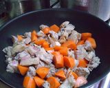 A picture of step 2 of Pork and Sugar Tomato Fruit Curry.