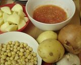 A picture of step 1 of Indian Home-style Curry with Potatoes and Chickpeas.