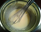 A picture of step 10 of White Chocolate Cupcakes with White Chocolate Whipped Cream Frosting.