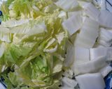 A picture of step 1 of Simple and Warming Chinese Cabbage and Clam Cream Stew.