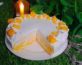 A picture of step 9 of Mango Crepe Cake 🥭.