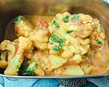 A picture of step 7 of Cauliflower, potato gravy masala vegetable.