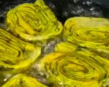A picture of step 9 of Authentic Rickwach with Urad Dal and Colocasia leaves.