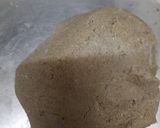 A picture of step 1 of Crunchy garlicky pearl millet vaghariyu.