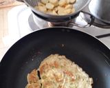 A picture of step 4 of Toasted bread with fried potatoes n egg stick.