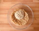 A picture of step 1 of Puffed Rice and Almond Tart with Tropical Fruit Cream.