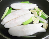 A picture of step 2 of Easy Simmered Flounder in a Frying Pan.