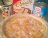 A picture of step 2 of Sunshine's creamy peach dump cake.
