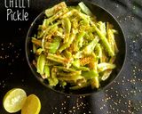 A picture of step 4 of Green chilli pickles.