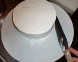 A picture of step 13 of The Trick to Making a Beautiful Decorated Cake.