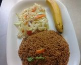 A picture of step 10 of Beef pilau Rice, steamed cabbages n a banana.