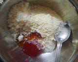 A picture of step 2 of Jam stuffed coconut chocolate.
