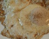 A picture of step 6 of Cheesy Grits with Hotdogs and Eggs.
