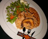 A picture of step 8 of Jollof Rice & Beans, wif salad.