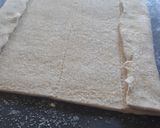 Foto del paso 3 de la receta: Orejas de masa hojaldre