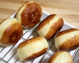 A picture of step 8 of Melt-in-your-mouth Hawaiian Malasada Donuts.
