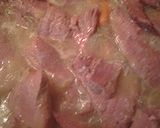 A picture of step 4 of Cornbeef in carrot and onion gravy.