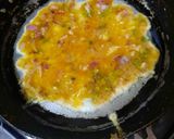 A picture of step 4 of Omelet Sandwich.