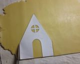 A picture of step 12 of Decorated Cookie House Hexen (Witch) House.