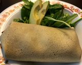 A picture of step 6 of Mouth watering breakfast wrap.