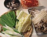 A picture of step 2 of Pork Kimchi Hot Pot with Delicious Soup.