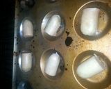 A picture of step 3 of Tiddly Puds (toad in the hole).