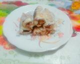 A picture of step 5 of Delicious tasty banana nutella bread roll.