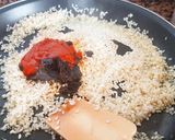 Foto del paso 5 de la receta: "Socarrat" de conservas, calamares, berberechos y bacalao 🔥🔥🔥