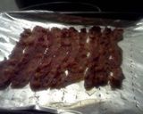 A picture of step 1 of Bacon & provolone stuffed pork roast topped w bacon & Stew tomato flvr brown rice w gr beans!.