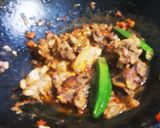 A picture of step 7 of Muamba De Galinha.
