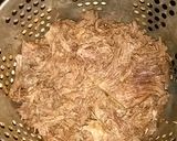 A picture of step 6 of Slow Cooker French Dip.