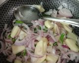 A picture of step 3 of #HBR kanda batata poha.