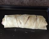 A picture of step 7 of Ham And Cheese Pinwheels.