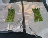 A picture of step 2 of Pesto Salmon and Asparagus in Foil.