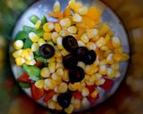 A picture of step 2 of Cheesy loaded vegetable Nachos.