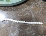 A picture of step 5 of Nikah Themed Cake.