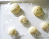 A picture of step 5 of Light and Puffy Homemade Naan Bread in a Pan.