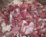 A picture of step 1 of Braised Lamb Shanks with Hummus Moutabal.