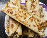 A picture of step 4 of Veg Cheese Frankie.