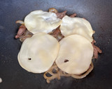 A picture of step 3 of Homemade Philly Cheesesteaks.