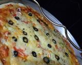 A picture of step 6 of Chicken Tikka Pizza.