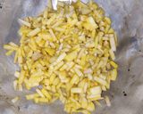 A picture of step 2 of Kadali Manja Rai (Banana stem curry in mustard paste).