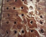 A picture of step 4 of Better Than Sex Cake.