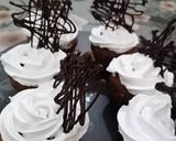A picture of step 6 of Chocolate cupcakes with froasting ❤❤.