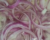 A picture of step 3 of Chilli Onion Rings or Laccha onion.
