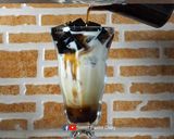 A picture of step 9 of Grass Jelly Snow Ice with Fresh Milk and Caramel Sauce.