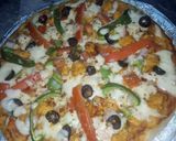 A picture of step 4 of Smoked chicken tikka flavour pizza 🍕🍕🍕🍕😋😋😋😋.
