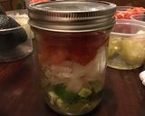 A picture of step 4 of California Farm Fresh Salsa, layered.