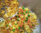 A picture of step 6 of Vegetable Broken Wheat khichdi.