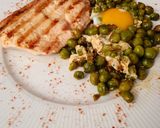 Foto del paso 4 de la receta: Colchón de arvejas con filete de pechuga a la plancha